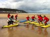 Surfing lessons of Battle Abbey School at a beach near Hastings